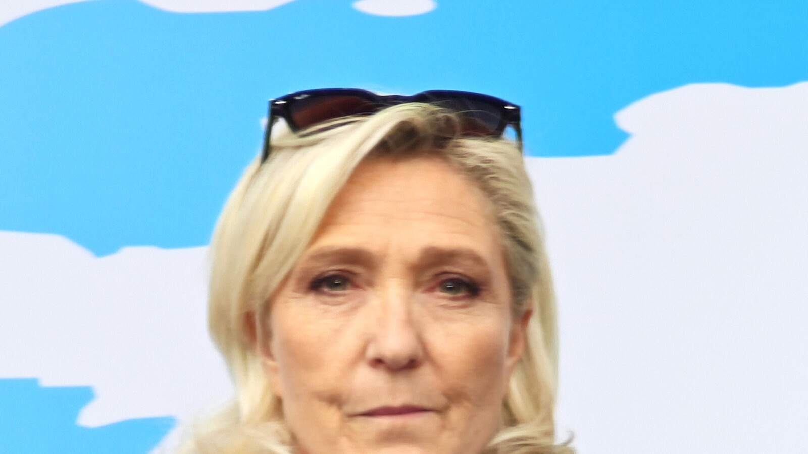 Marine Le Pen speaking at a political gathering in Budapest in March 2026