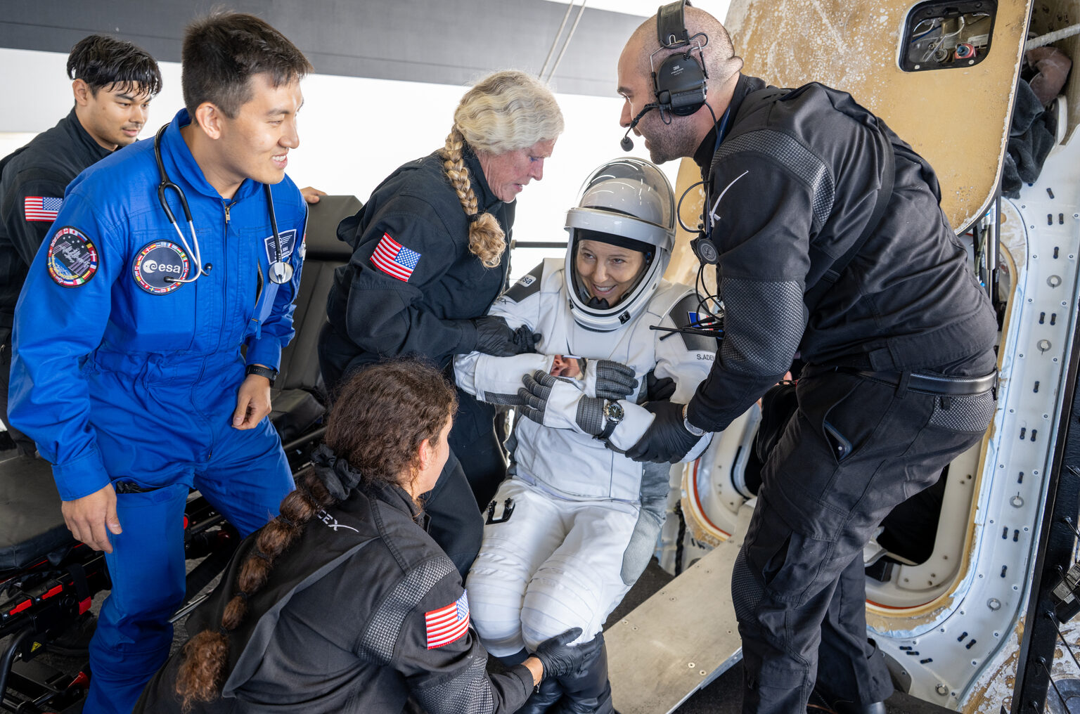 ESA astronaut Sophie Adenot is helped from the Crew-12 capsule after splashdown on 8 October 2026.